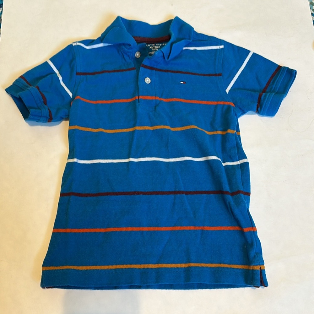 Tommy Hilfiger Boys Blue polo shirt with orange white brown stripes